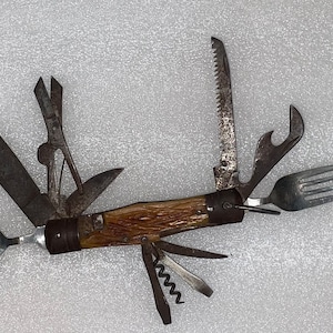 Vintage multifunctional folding knife marked made in Japan