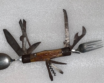 Navaja plegable multifunción vintage marcada como "fabricada en Japón"