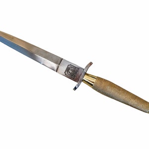 May include: A silver dagger with a double-edged blade and a textured, tan handle. The handle is accented with gold-coloured metal. The dagger has a crossguard and a rounded pommel. The blade has the text "F S" on it.