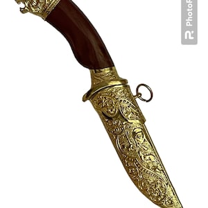 手作りの金色の真鍮の鞘、ライオンの頭、鋼の刃のナイフ、短剣
