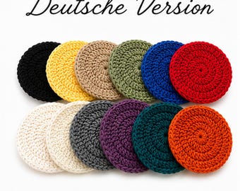 May include: A collection of eleven crocheted circular items in various colors, including black, yellow, beige, green, blue, and red. Additional colors are white, gray, purple, teal, and orange. The text "Deutsche Version" is written in cursive at the top.