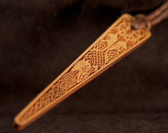 Celtic Art Pendant Etched in Cherry Wood from the Book of Kells, made in Ireland.