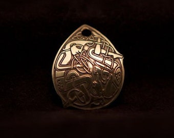 Celtic Art Pendant, The Beard Pullers. Etched in Brass. Adapted from The Book of Kells.