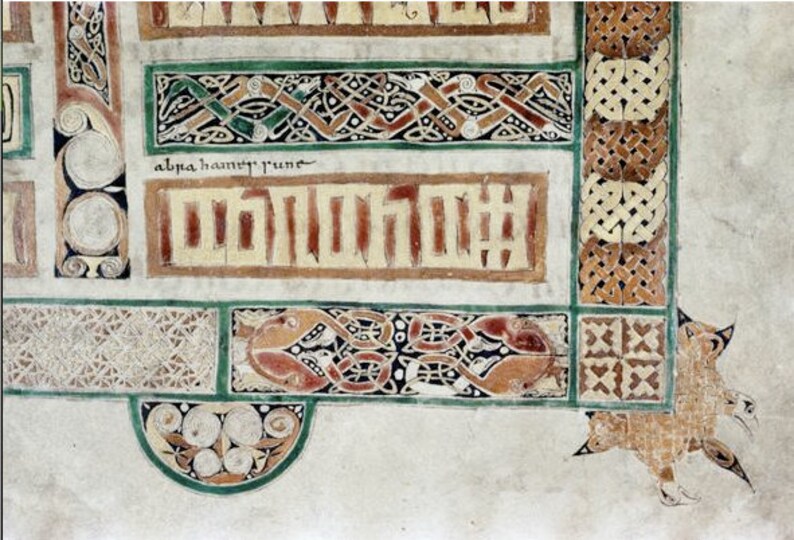May include: A close-up of a page from an illuminated manuscript. The page features intricate Celtic knotwork in shades of green, brown, and red. The text "alpha hauncy rune" is written in black ink.