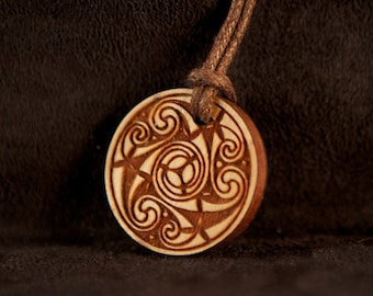 Celtic Art ( Pictish ) Spiral Pendant, Etched in Cherry Wood from The Book of Durrow, made in Ireland.