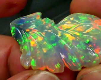 22.79 cts – Best of Breed Super Vivid Neon Autmn Colors Leaf Carving Transparent Crystal Welo Opal With Video!