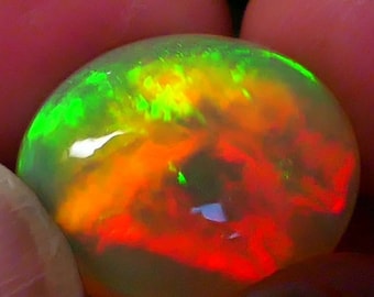 12.18 cts – Top Class Two-Sided Super Vivid Neon Rolling Broadflash Pattern Transparent Crystal Welo Opal