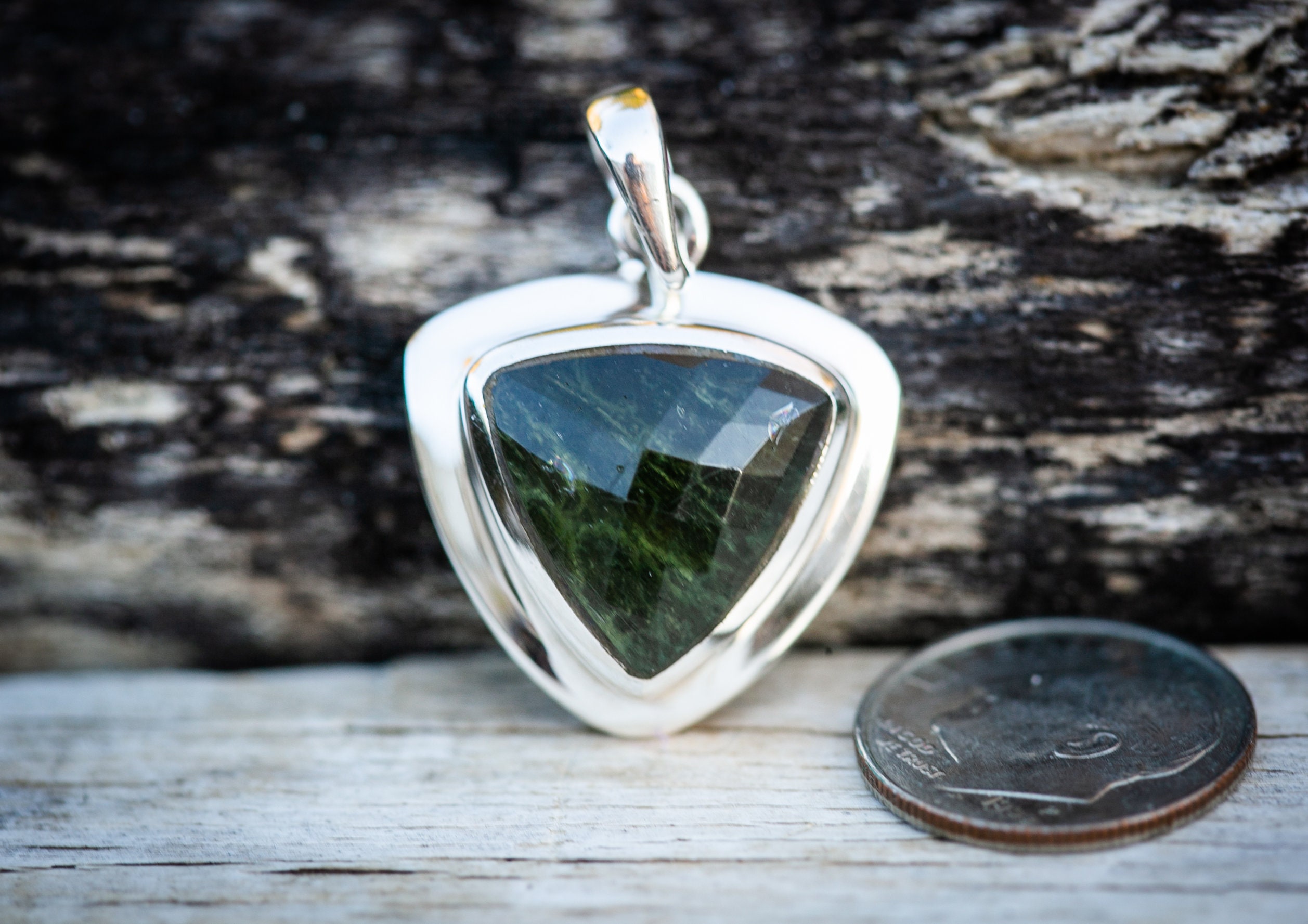 Polished moldavite pendant deals
