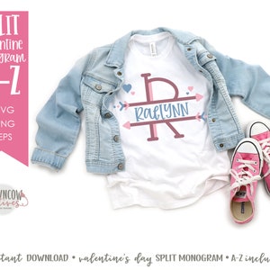 May include: A white t-shirt with a split monogram design featuring the name "Raelynn" in blue, with pink arrows and hearts. The shirt is paired with a light blue denim jacket and pink sneakers. Text on the image reads "SPLIT Valentine Monogram A-Z".
