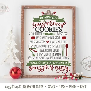 May include: A printable sign with a gingerbread cookie recipe. The sign is framed in wood and has a red heart, a gingerbread man, and candy canes. The recipe includes ingredients like butter, brown sugar, molasses, flour, baking soda, salt, ginger, cinnamon, allspice, and cloves. The sign also says "Bake @ 350&deg; for 10 minutes" and "Snuggle & Enjoy".