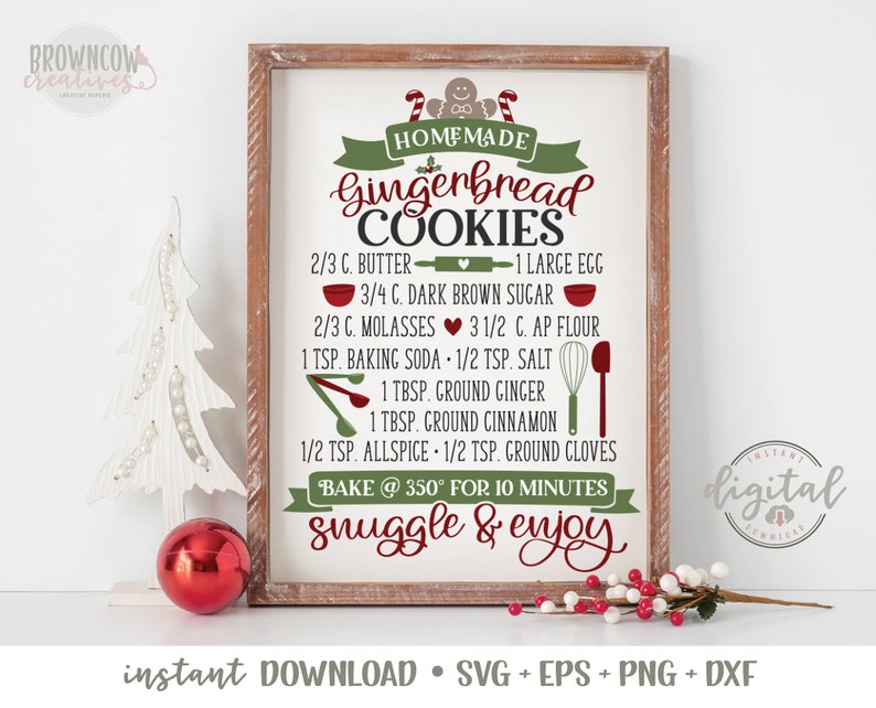 May include: A printable sign with a gingerbread cookie recipe. The sign is framed in wood and has a red heart, a gingerbread man, and candy canes. The recipe includes ingredients like butter, brown sugar, molasses, flour, baking soda, salt, ginger, cinnamon, allspice, and cloves. The sign also says "Bake @ 350&deg; for 10 minutes" and "Snuggle & Enjoy".