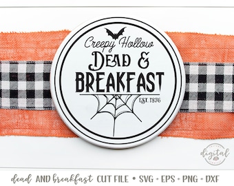 May include: A white round sign with black text that reads "Creepy Hollow Dead & Breakfast Est. 1876". A black bat and spiderweb are also on the sign.