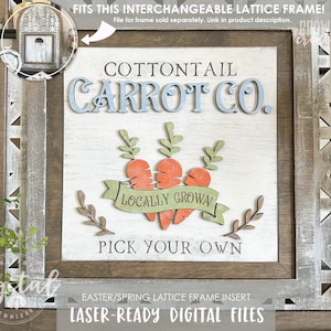 May include: A white sign with the text "COTTONTAIL CARROT CO." in blue and brown lettering. The sign also features a banner with the text "LOCALLY GROWN" and three cartoon carrots with green leaves. The text "PICK YOUR OWN" is at the bottom of the sign. The sign is framed in a rustic brown wood frame with a whitewashed finish.