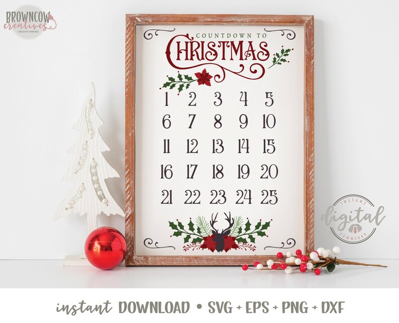 May include: A wooden framed sign with a white background and a red and green Christmas countdown design. The sign says "Countdown to Christmas" and features numbers 1 through 25.