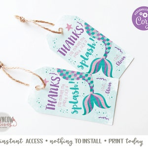 May include: Two turquoise and purple mermaid tail favor tags with the text "Thanks for making my party such a splash!" and "Love, Olivia".