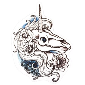 May include: A black and white line drawing of a unicorn skull with a horn, surrounded by flowers. The skull is detailed with a blue eye and the flowers are stylized.
