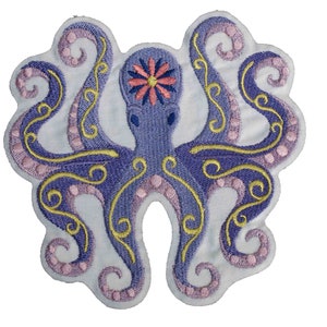 May include: Embroidered iron-on patch featuring a purple octopus with yellow and pink details. The octopus has eight tentacles with swirling designs and a pink flower on its head.