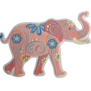 May include: An embroidered elephant patch in pink with blue and green floral designs. The elephant is walking with its trunk raised.