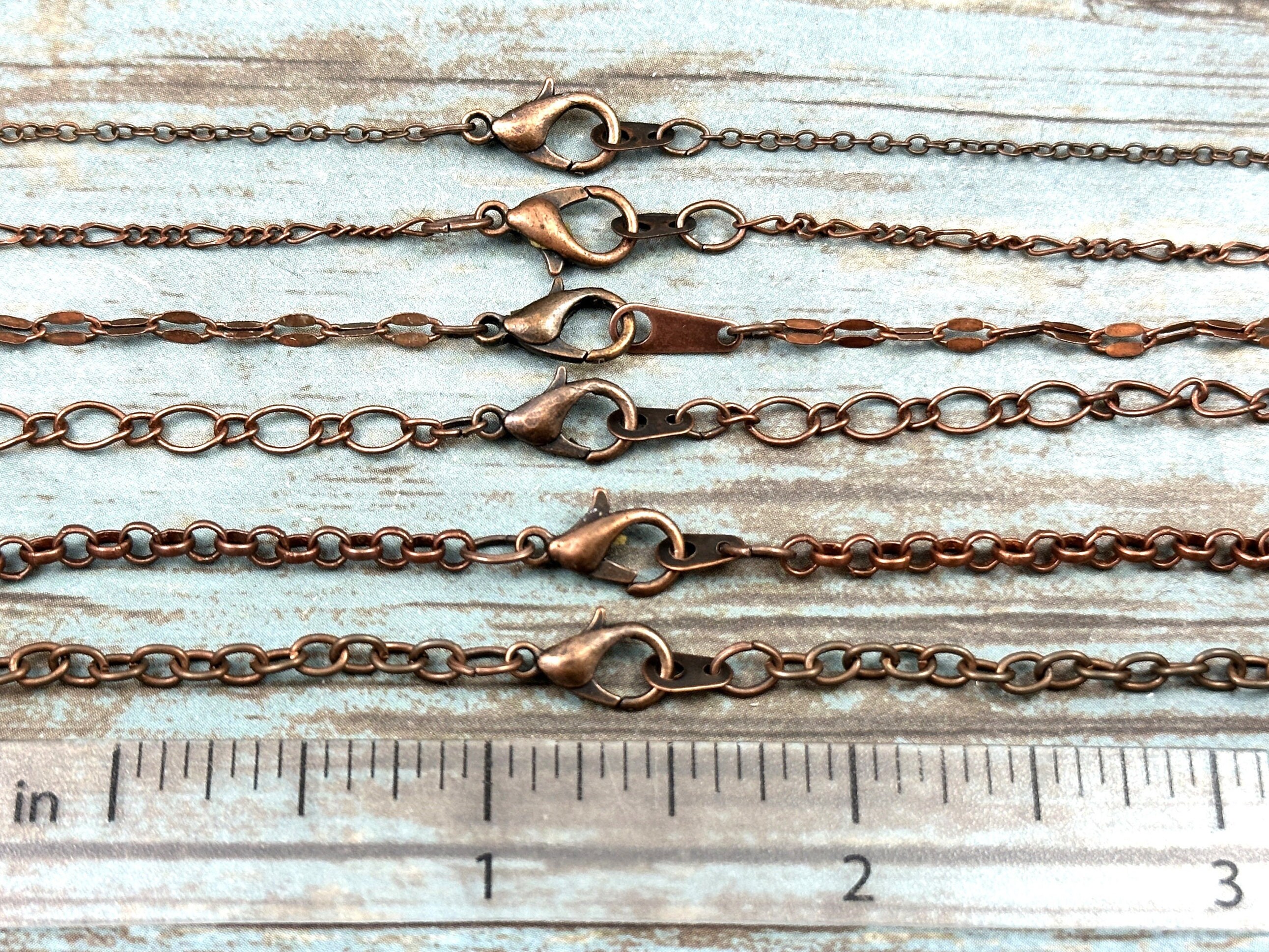 KMO Paris Silver Triple Chain Necklace with Central Copper Chain
