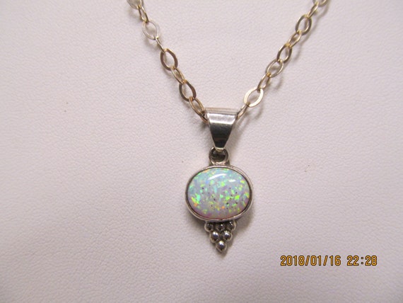 Sterling silver and opal pendent - image 1