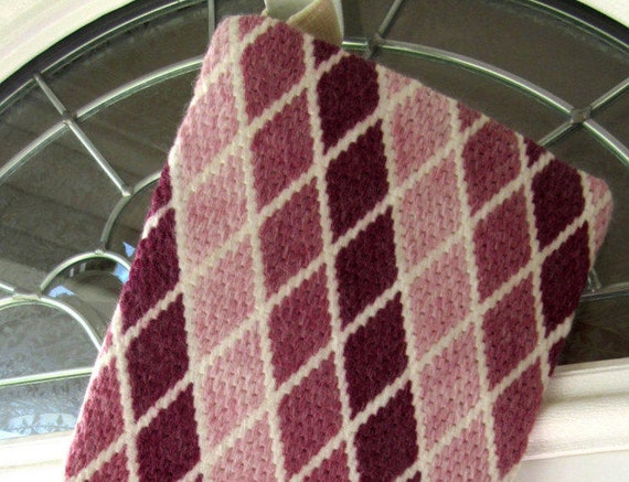 Christmas stocking needlepoint traditional bargello pattern done in teals and white The length is 15 12 and the width at top is 6 12.