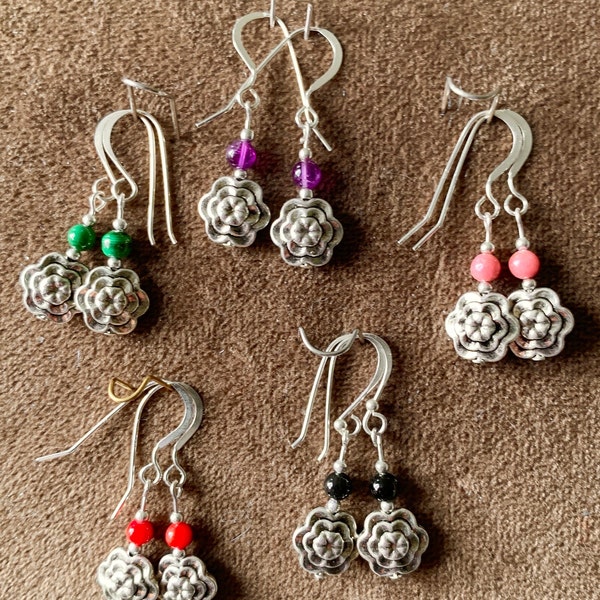 Earrings, coral, onyx, malachite, amethyst,  and rhodonite gemstones, pewter flower, sterling silver handmade earwires, length 1 1/2 inches.