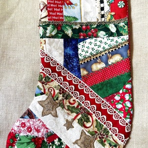 Christmas stocking, crazy quilt sewing, cotton fabric, 14 inches  length. 6 1/2 at top, red with dots back and hanger,  lined white cotton