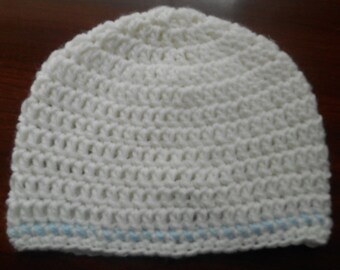 This soft white hand crocheted baby hat with blue accent will keep your baby warm and accent that precious out fit. Comes in size 0-3 mos.