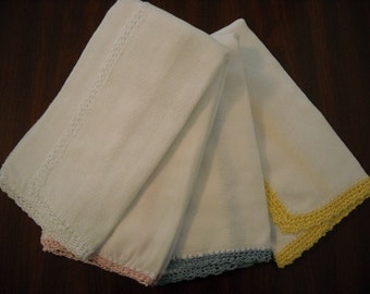 Burp cloth with delicate tiny crochet trim. They come in white, yellow, pink or blue.