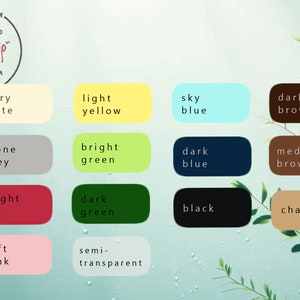 May include: A color palette featuring various hues, including ivory white, light yellow, sky blue, dark brown, and more. The image includes the text "HANDMADE IN THE USA" and "Heartskip GIFTS etsy.com".
