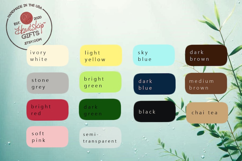 May include: A color palette featuring various hues, including ivory white, light yellow, sky blue, dark brown, and more. The image includes the text "HANDMADE IN THE USA" and "Heartskip GIFTS etsy.com".