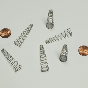 Fun metal conic springs from the Korean War - set of 6