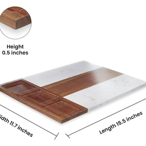 May include: A rectangular serving tray with a white marble top and a wooden base. The tray has three small wooden compartments on one side. The tray measures 15.5 inches long, 11.7 inches wide, and 0.5 inches high.