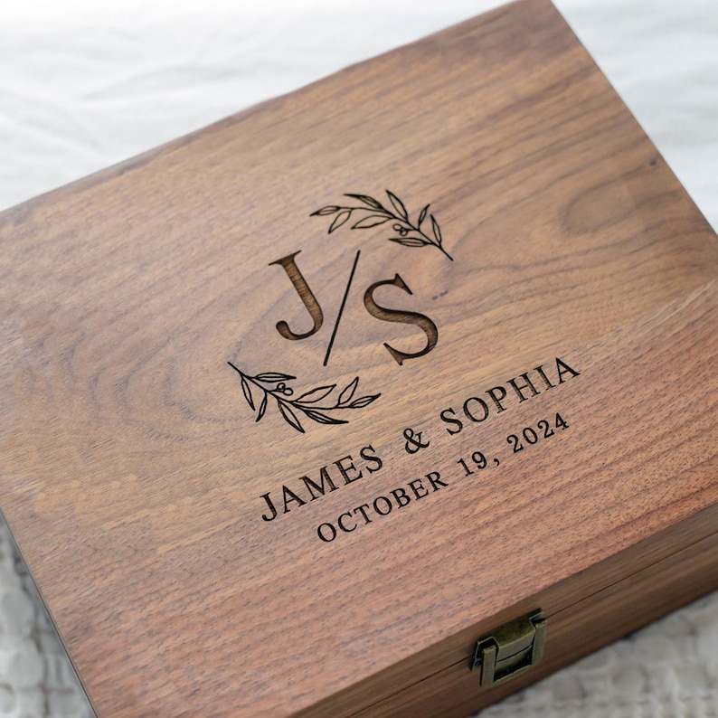 Personalized walnut keepsake box with latch and hinge.