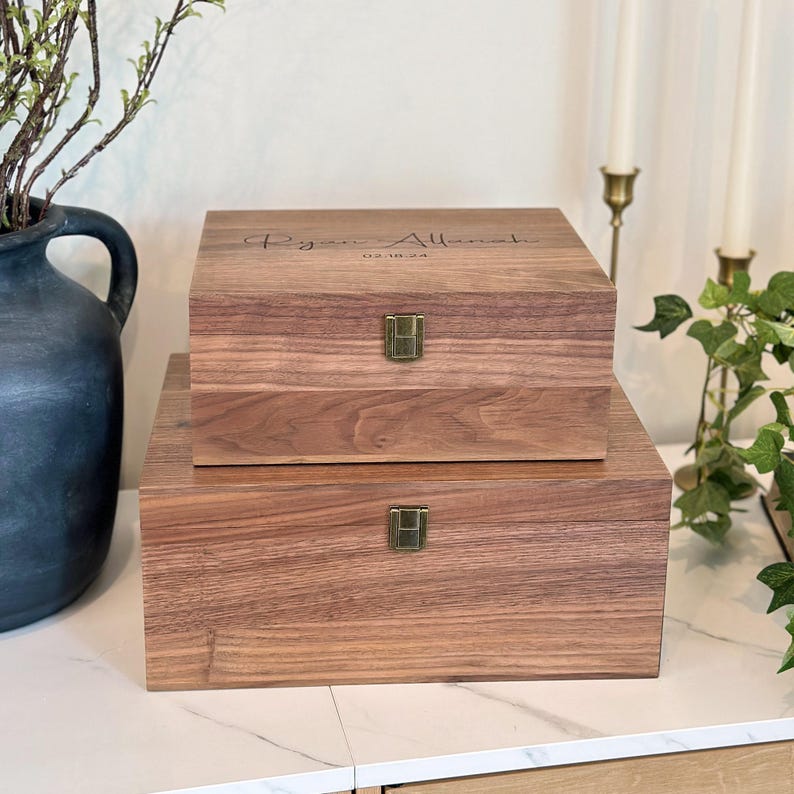 Personalized walnut keepsake box with latch and hinge.