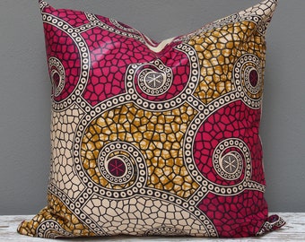 Shocking pink Java African wax print scatter cushion 50 x 50cm: add a splash of colour to your home with this unique mixed print cushion