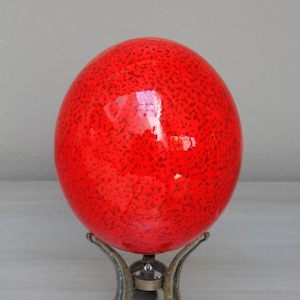 Speckled red ostrich egg: an iconic decorative piece for the home or office, can be grouped in a bowl or contrasted with red glazed eggs