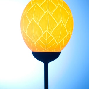 Protea flower themed ostrich egg lamp: SA&#39;s most iconic flowers, the Protea is carved onto an ostrich eggshell to create this unique lamp