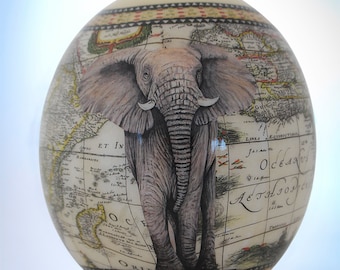Decoupage Elephant ostrich egg: The majestic African elephant poses in all its glory on the exquisitely painted ostrich eggshell piece