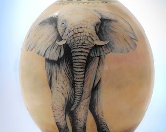 Decoupage Elephant ostrich egg: The majestic African elephant poses in all its glory on the exquisitely painted ostrich eggshell piece