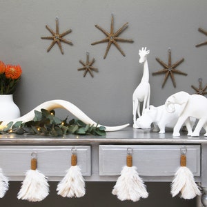 Gold beaded star decorations: Add some fiery spice to the Christmas tree with these simple yet stunning gold beaded stars