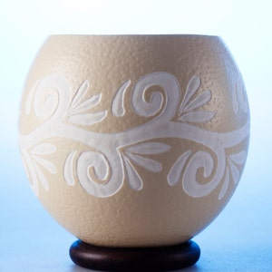 Straight edge ostrich egg bowl: engraved pattern circling the edge of an African ostrich eggshell
