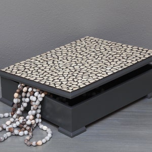 African gift box: this display storage box comes in two sizes, is rendered in grey hues and is encrusted with mosaic pieces of ostrich egg image 1
