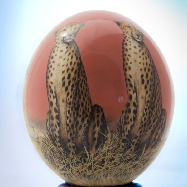 Decoupage Cheetah ostrich egg: Two beautifully rendered cheetahs grace the front of this beautifully painted ostrich eggshell decor item