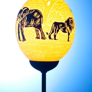 Big 5 black ostrich egg lamp: handcrafted Ostrich eggshell lamp with African bush and Big 5 depictions in black