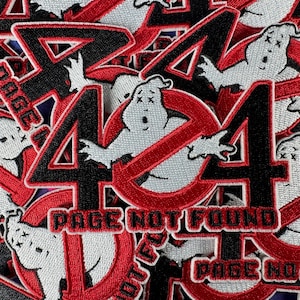May include: A stack of red, white, and black embroidered patches featuring a ghost with a crossed-out circle and the text "PAGE NOT FOUND".
