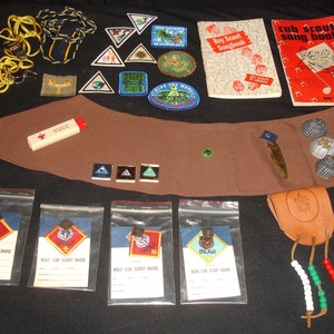 Lot of Vintage Boy/Girl/Cub Scout Badges Slides Sash Whistles Songbooks More