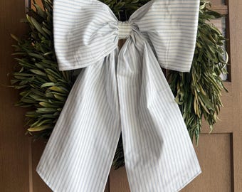 White and Blue Striped Fabric Bow