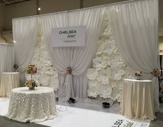 White paper flower wedding ceremony backdrop