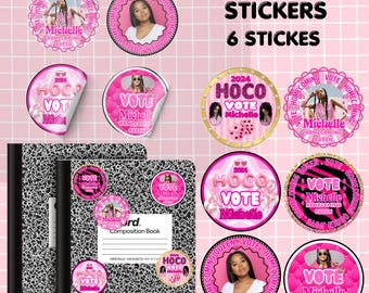May include: Six pink and black round stickers with a photo of a young woman and the text "Vote Michelle Homecoming Queen" and "2024 HOCO Vote Michelle".